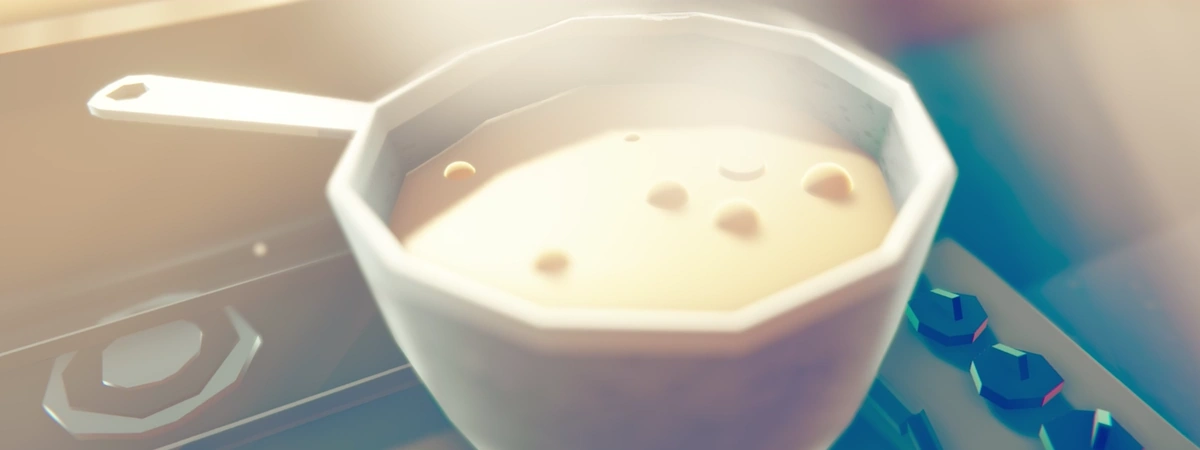 A bowl of soup steaming on the counter